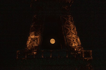 View on the Eiffel Twoer at night with full moon