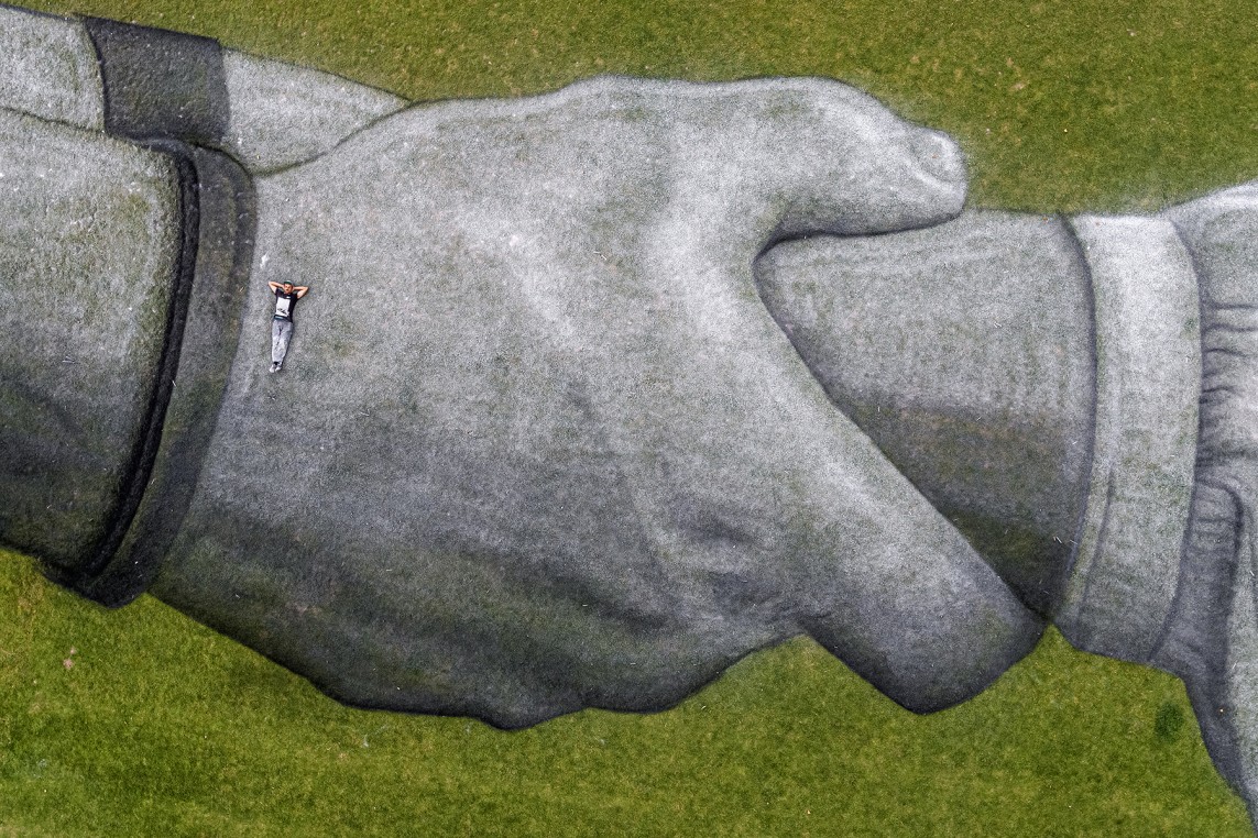 the giant fresco of SAYPE from the Eiffel Tower